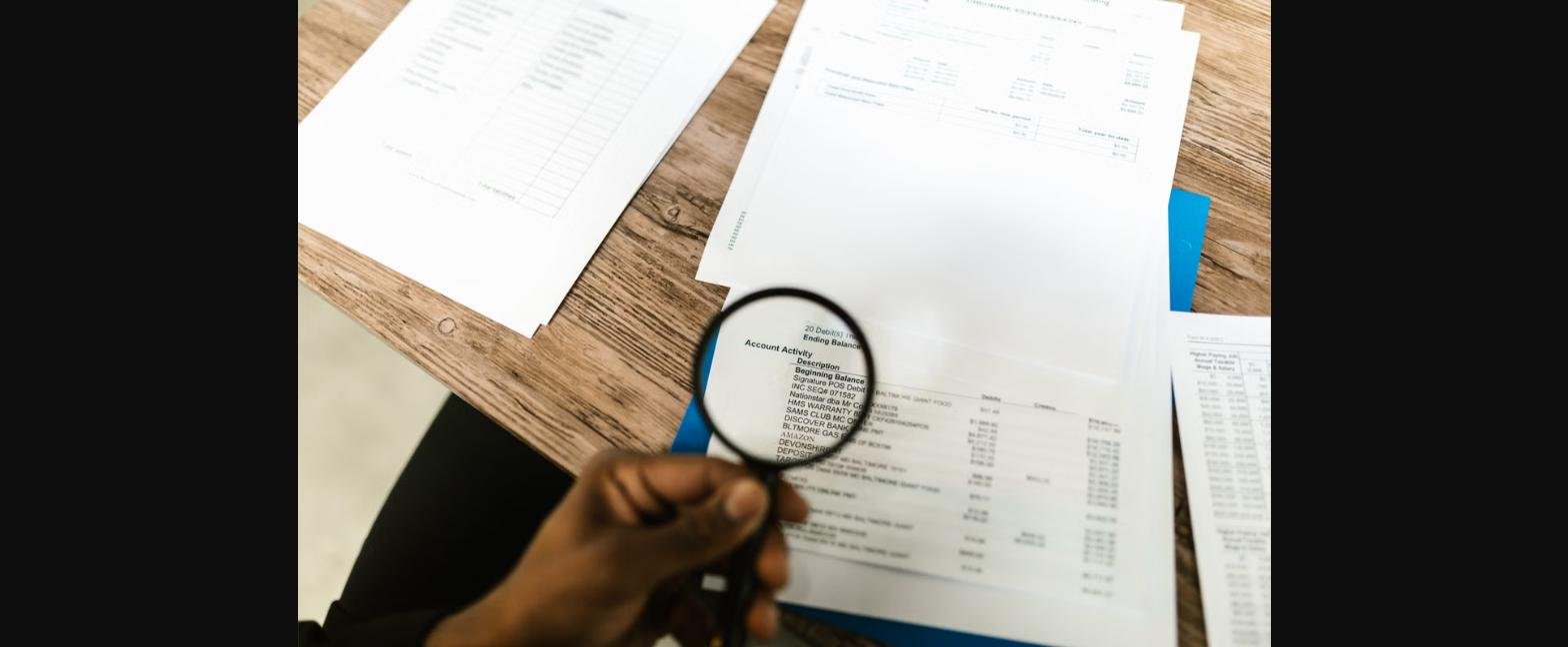 How to read the visa bulletin with magnifying glass over document